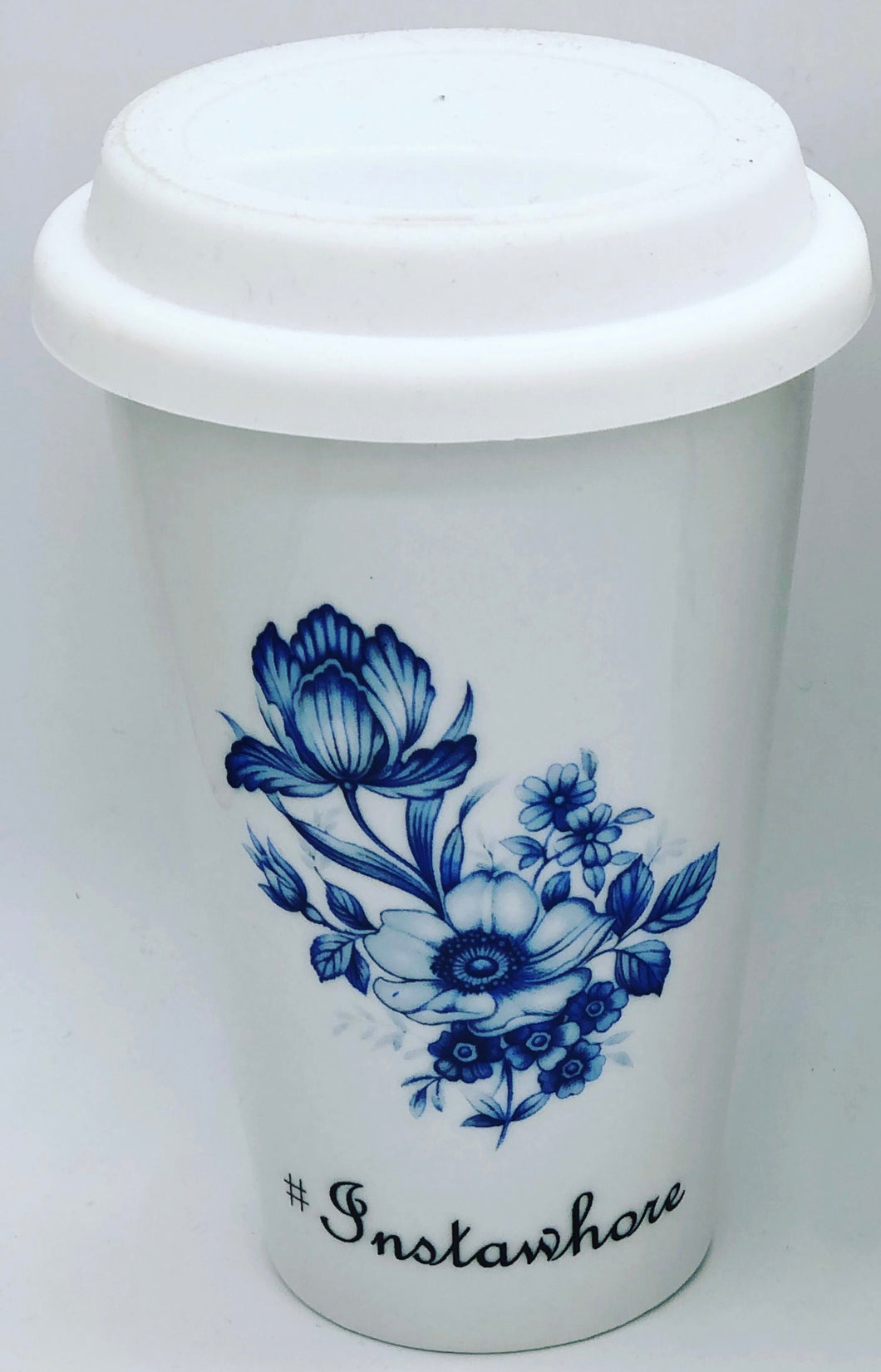 A personalised travel mug with your choice of words and florals